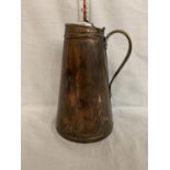 A BENSONS BRASS AND COPPER JUG