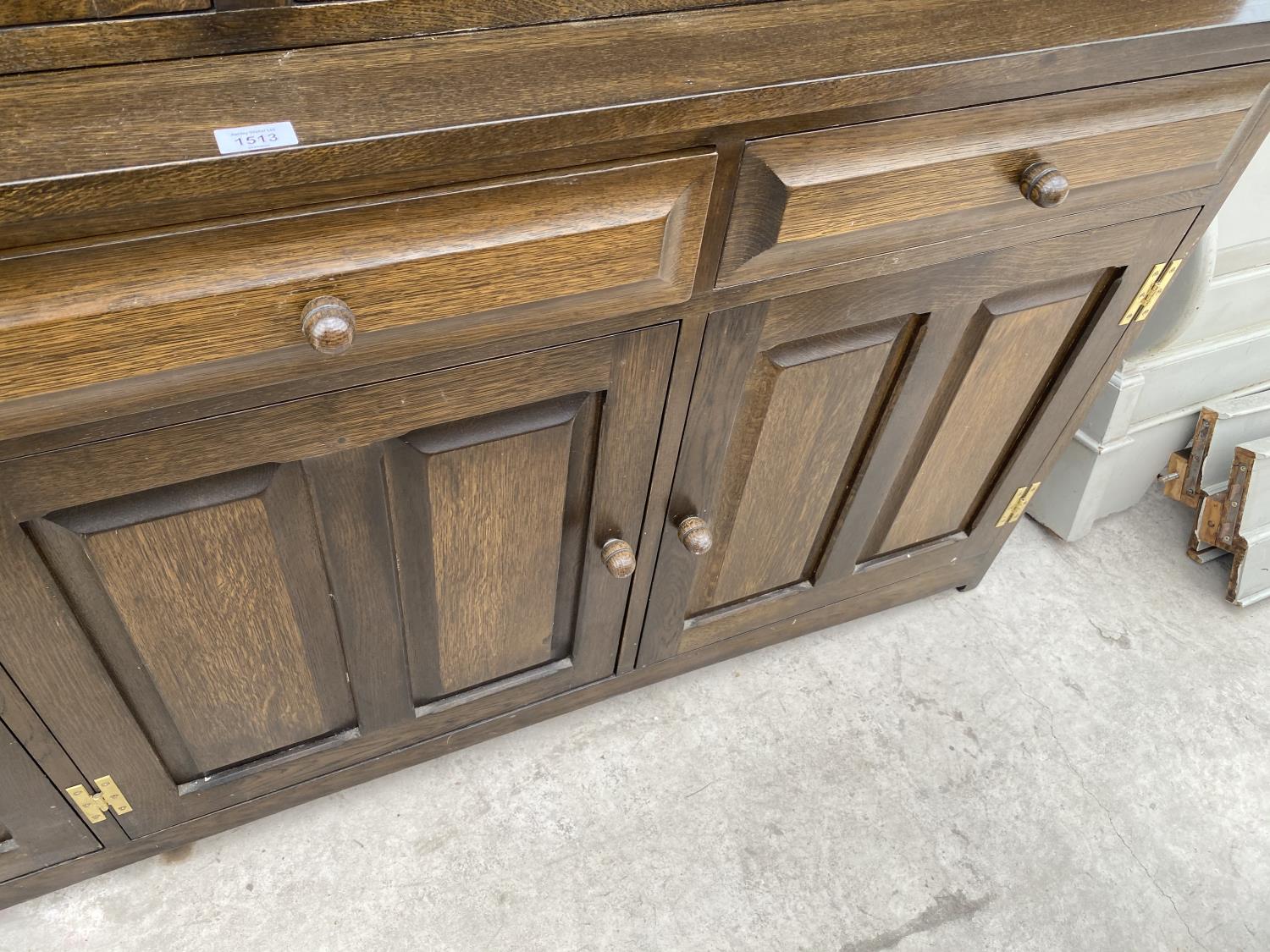 A LARGE SOLID OAK CABINET WITH THREE LOWER DOORS AND DRAWERS AND FOUR UPPER GLAZED DOORS - Image 5 of 5