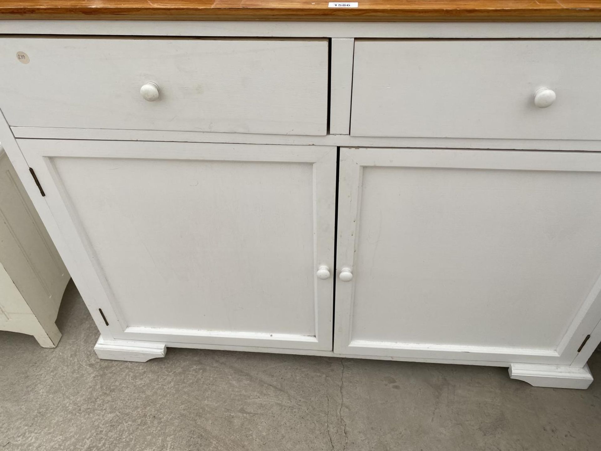 A WHITE CABINET WITH TWO DOORS, TWO DRAWERS AND PINE TOP - Image 3 of 3