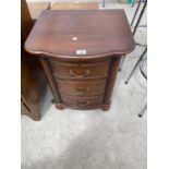 A SMALL MAHOGANY CHEST OF THREE DRAWERS