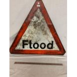 A METAL TRIANGULAR FLOOD SIGN