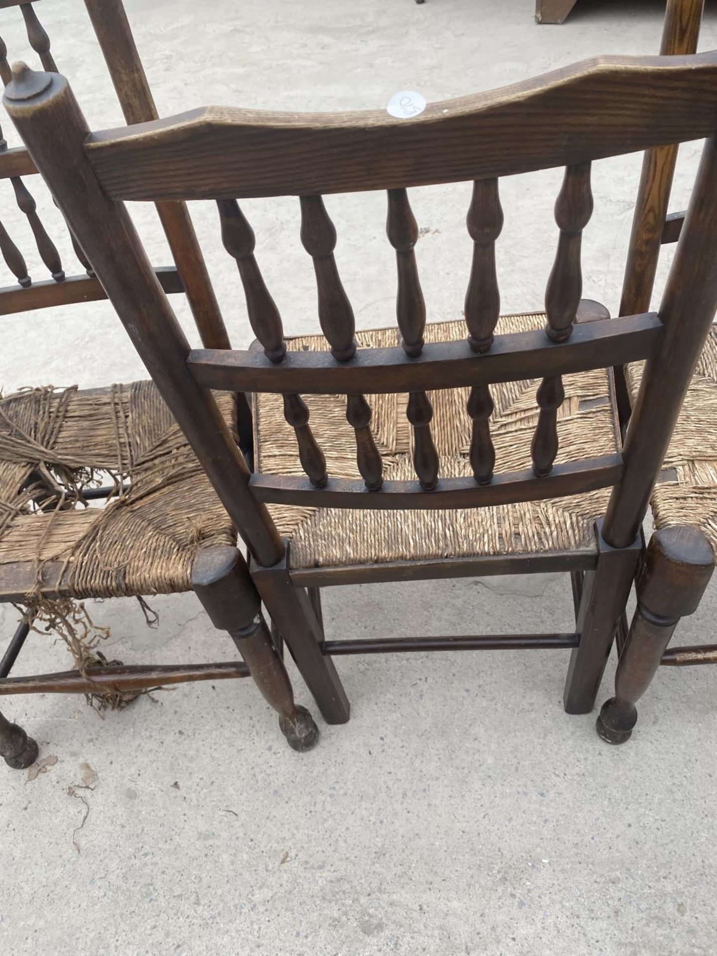 THREE OAK DINING CHAIRS WITH RUSH SEAT (TWO REQUIRE ATTENTION TO SEAT) - Image 3 of 3