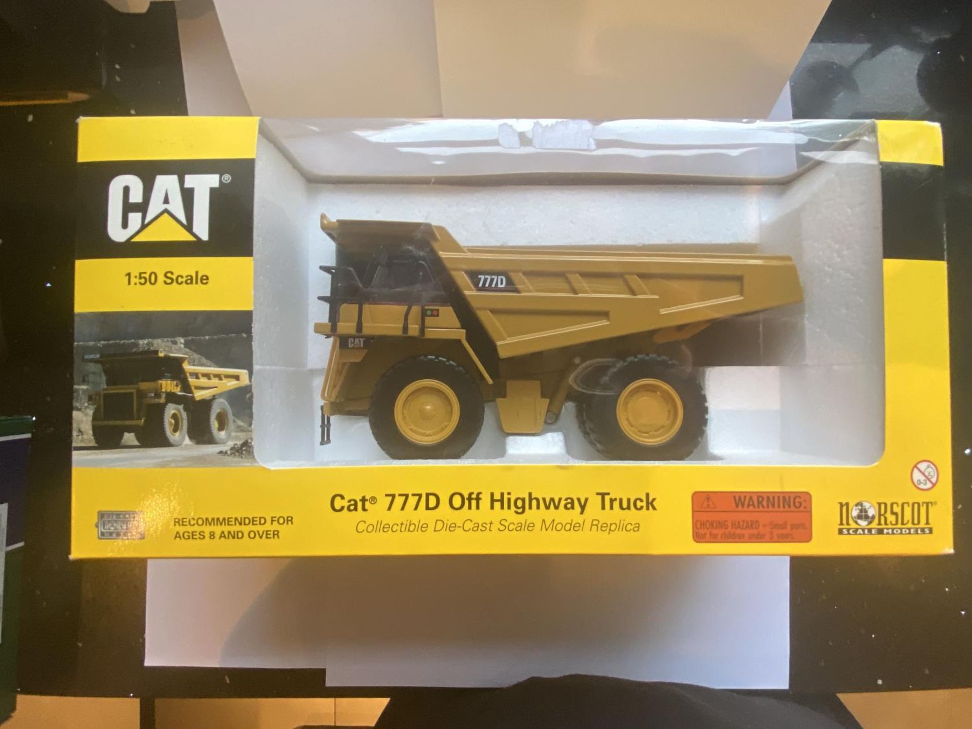 A NORSCOT 777D OFF HIGHWAY TRUCK 1:50 SCALE - IN MINT CONDITION AND BOXED