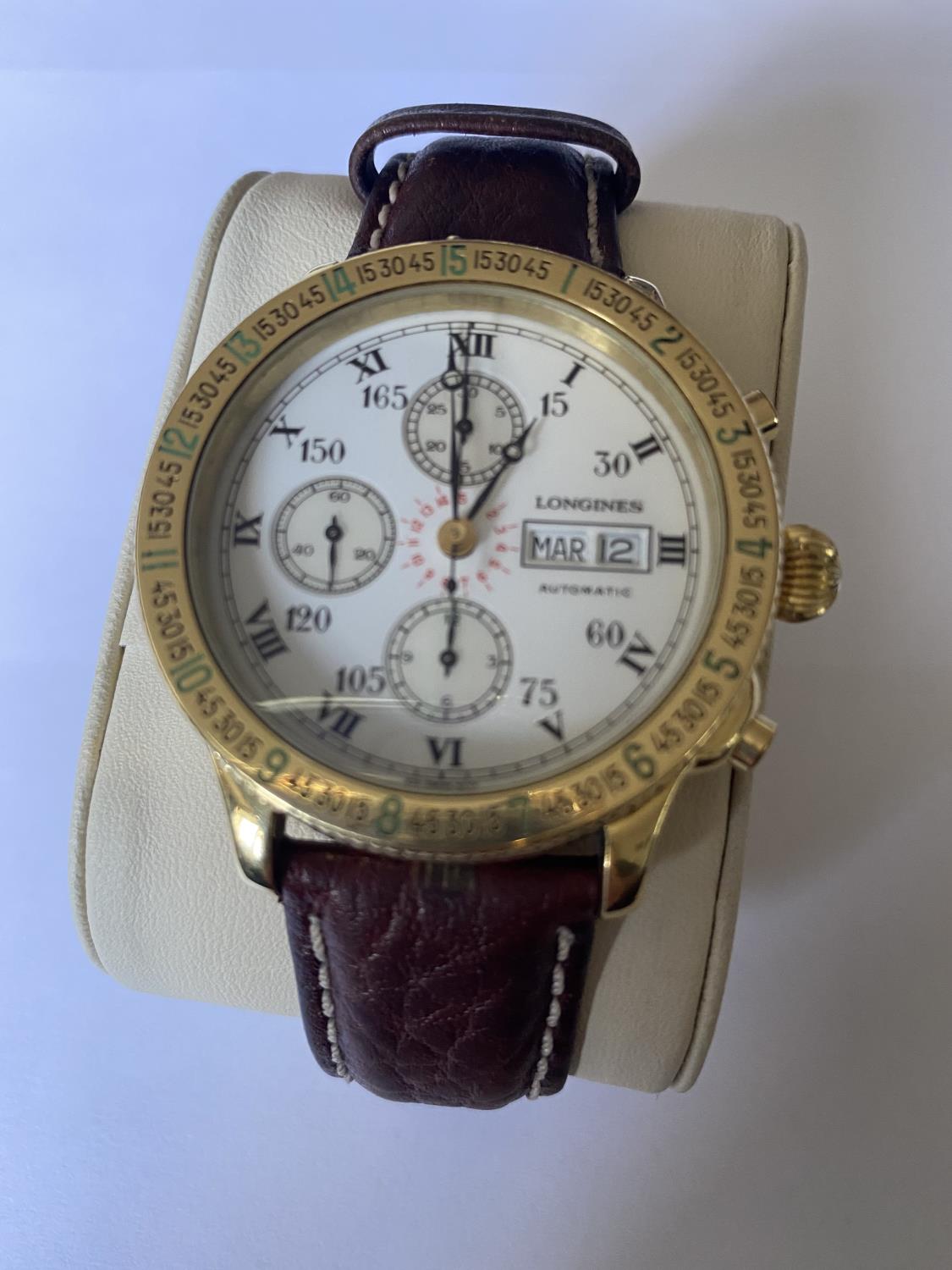 A LONGINES LINDEBERGH HOUR ANGLE WRIST WATCH WITH SOLID YELLOW GOLD CASE AND BEZEL, AUTOMATIC - Image 2 of 12
