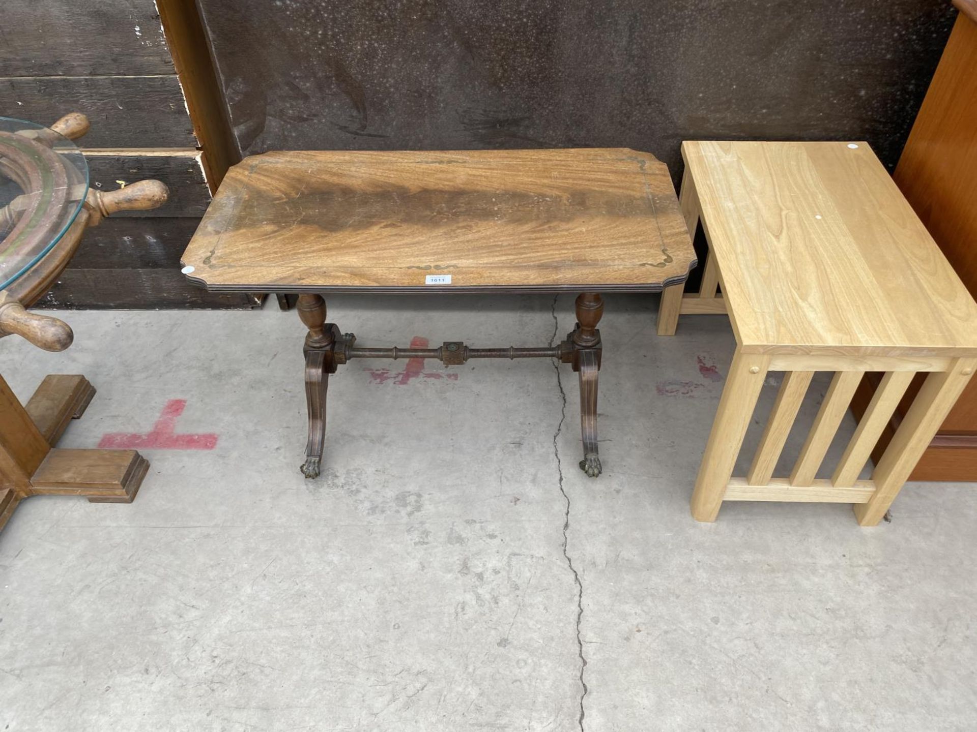 A MODERN OAK OCCASIONAL TABLE AND A MAHOGANY COFFEE TABLE