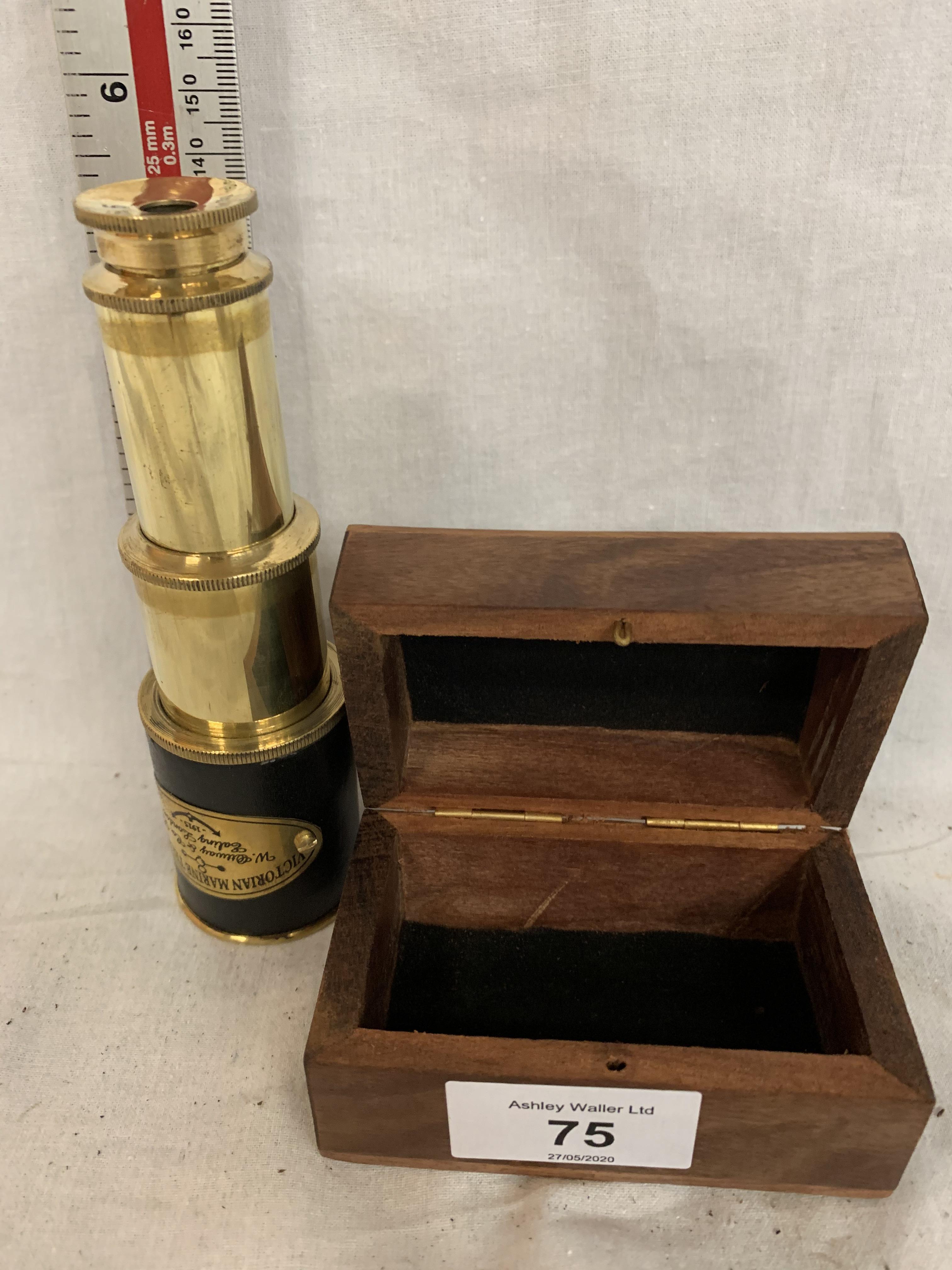 A BOXED BRASS AND LEATHER VICTORIAN MARINE TELESCOPE