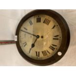 A CIRCULAR WOODEN FRAMED JOHN GARNETT OF LONDON WALL CLOCK