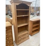 A TALL PINE FOUR TIER BOOKSHELF WITH TWO LOWER DRAWERS