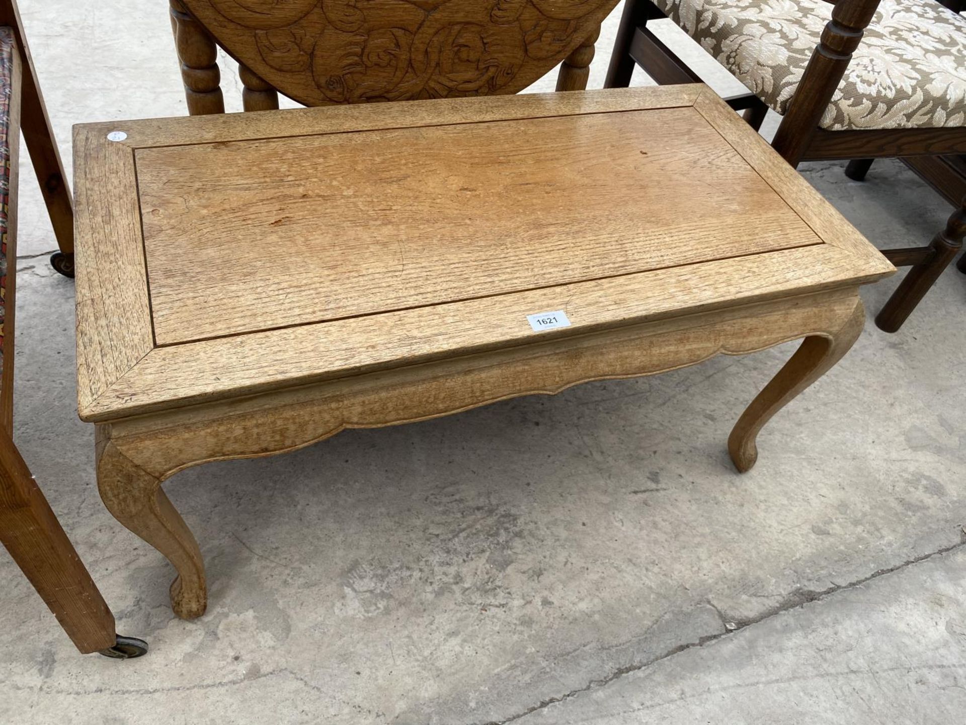 AN OAK COFFEE TABLE