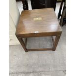 A MAHOGANY OCCASIONAL TABLE WITH BRASS CORNERS