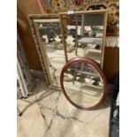 THREE VARIOUS MIRRORS TO INCLUDE AN OVAL WOODEN FRAMED AND TWO GILT EDGED RECTANGULAR