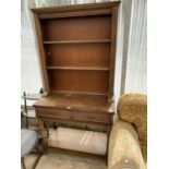 AN OAK DRESSER WITH TWO DRAWERS AND UPPER PLATE RACK