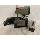 A HITACHI C1 BROADCAST CAMERA WITH ATTACHED SCREEN AND POWER PACK