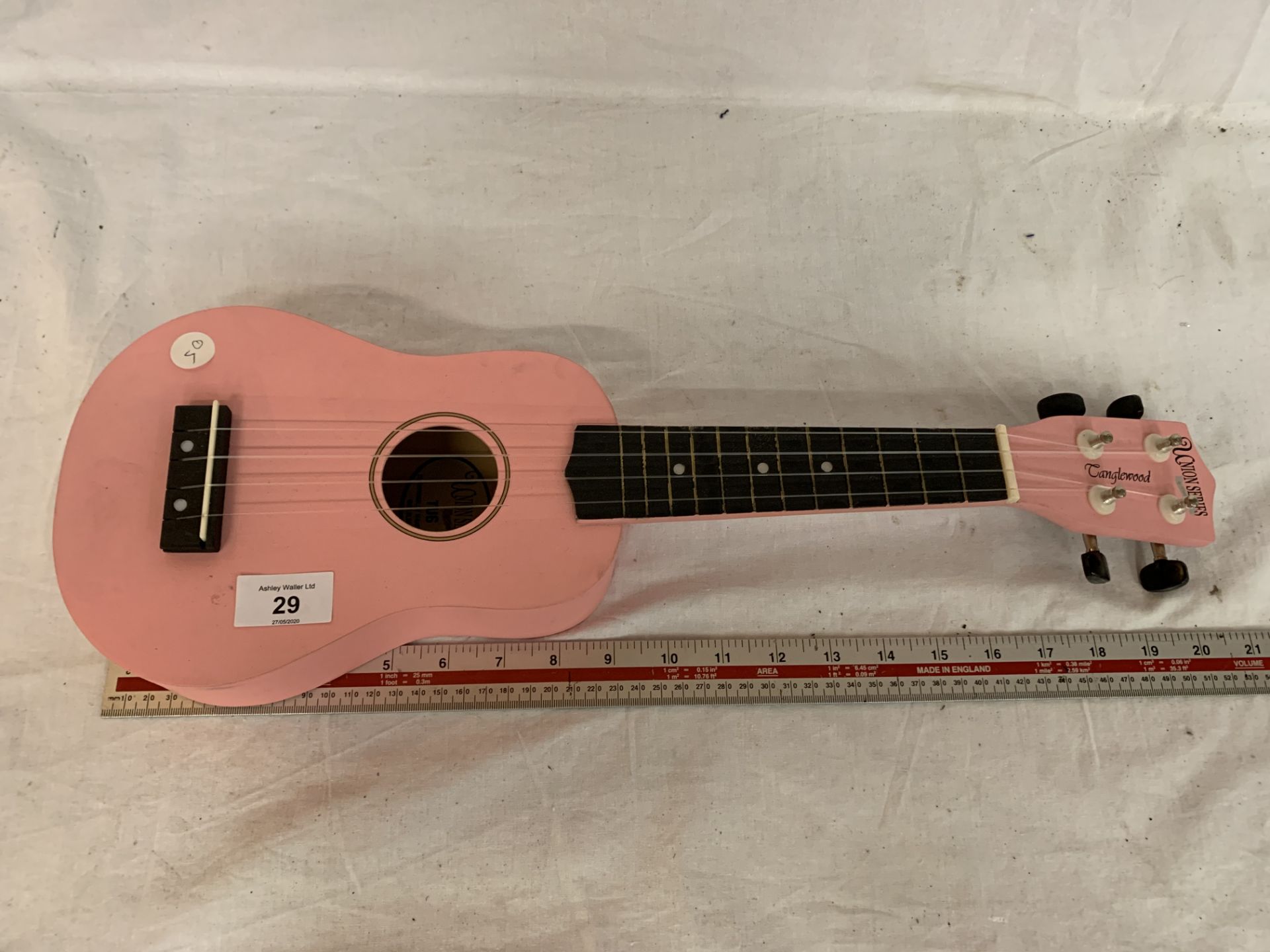 A CHILDS PINK UNION SERIES TANGLEWOOD GUITAR