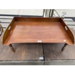 A MAHOGANY TRAY TABLE