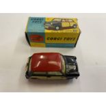 A CORGI TOYS MINI-COOPER WITH DE-LUXE WICKERWORK PANELS AND RED TOP, BOXED, MODEL NUMBER 249