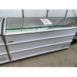 A LARGE SHOP CHEST FREEZER WITH BASKETS REGULARLY MAINTAINED AND IN CLEAN AND WORKING ORDER