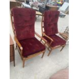 TWO PARKER KNOLL MAHOGANY ARMCHAIRS