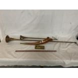 TWO COPPER HUNTING HORNS AND A HORN MOUNTED ON A BRASS BASE
