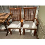 YWO WICKER ARMCHAIRS