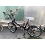 A VINTAGE LADIES FOLDING BICYCLE WITH A THREE SPEED STURMEY ARCHER SYSTEM