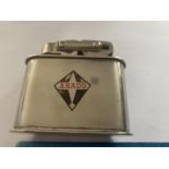 A LARGE VINTAGE ARADO LIGHTER