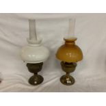 TWO BRASS OIL LAMPS WITH GLASS SHADES