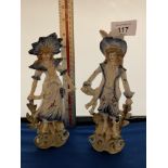 A PAIR OF CERAMIC LADY AND GENT FIGURINES