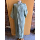 A PALE GREEN SILK DRESSING GOWN WITH EMBROIDERY (A/F INSIDE SEE PICTURES)