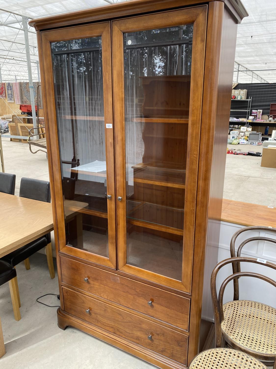 A WILLIS ABD GAMBIER CHERRY WOOD CABINET WITH TWO GLAZED DOORS AND TWO DRAWERS