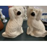 A PAIR OF LARGE STAFFORDSHIRE DOGS