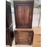 A GEORGIAN OAK LARDER CUPBOARD WITH ONE LOWER AND ONE UPPER DOOR