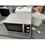 THREE ITEMS TO INCLUDE A MORPHY RICHARDS MICROWAVE, A SWAN BREADMAKER AND A MORPHY RICHARDS BREAD