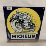 A 'MICHELIN' SIGN SHOWING THE MICHELIN MAN ON A MOTORBIKE