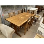 A PINE DINING TABLE AND FOUR PINE DINING CHAIRS