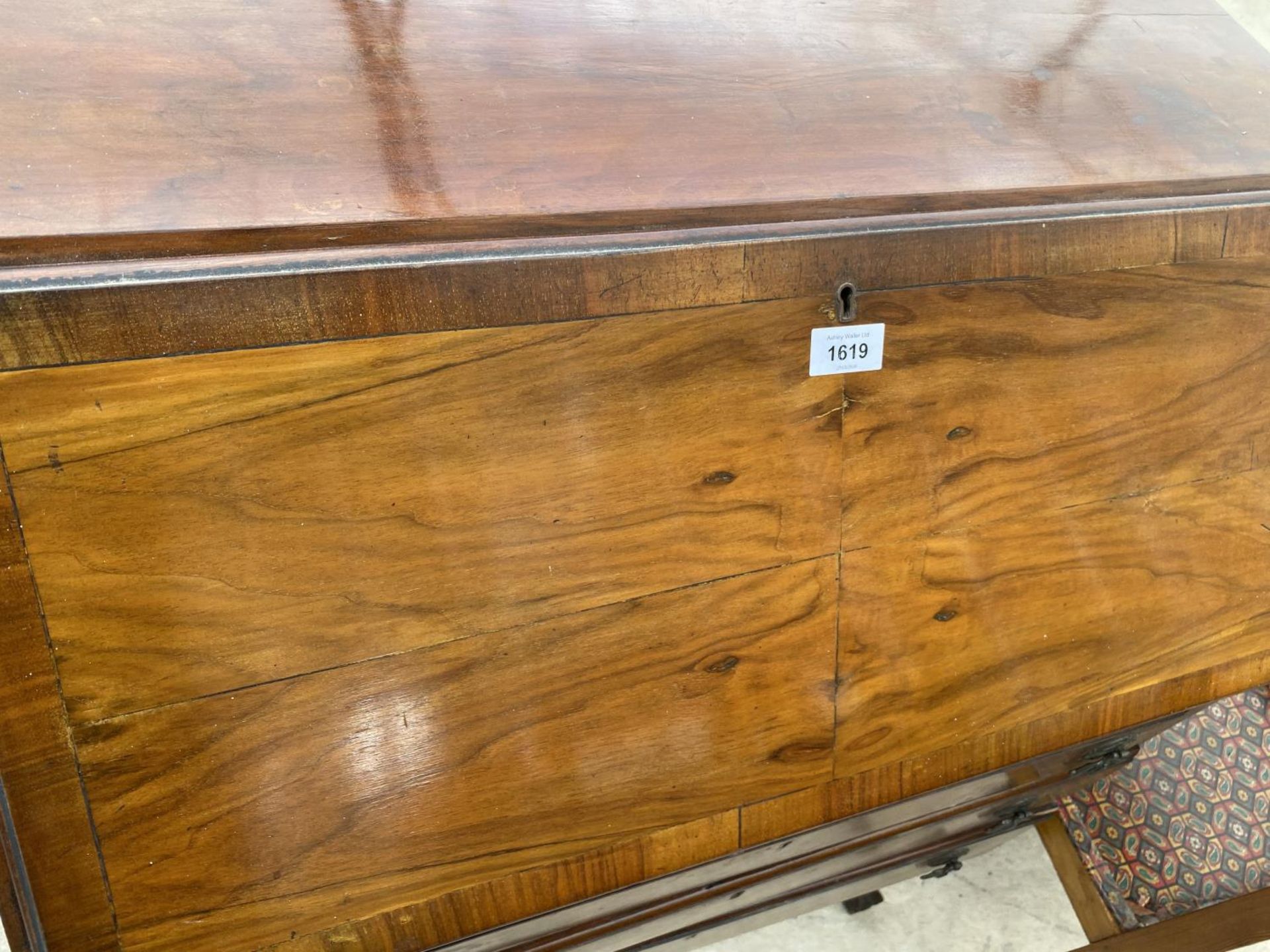 A MAHOGANY BUREAU ON CABRIOLE SUPPORTS WITH FALL FRONT AND THREE DRAWERS - Image 2 of 4