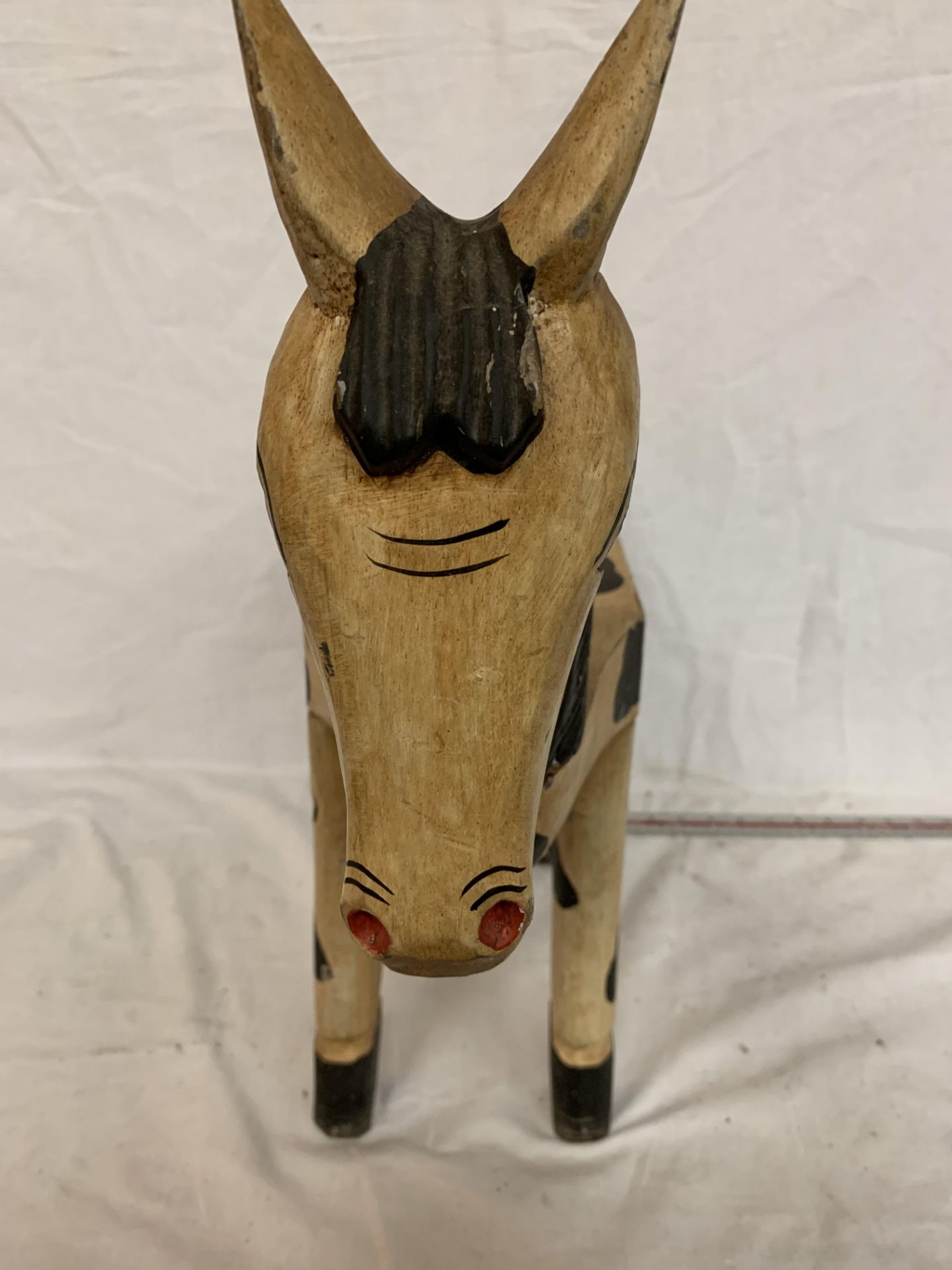 A WOODEN STOOL IN THE FORM OF A HORSE PAINTED IN THE STYLE OF AN APPALOOSA - Image 4 of 6