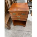 A SMALL CAMPAIGN STYLE MAHOGANY CHEST OF DRAWERS WITH TWO SHORT AND TWO LONG DRAWERS WITH RECESSED