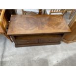 AN INDONESIAN WOOD SDE TABLE WITH TWO DRAWERS