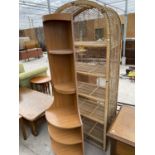 A RETRO TEAK CORNER CABINET AND A WICKER FIVE TIER SHELF