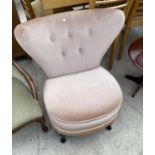 A BUTTON BACK BEDROOM CHAIR
