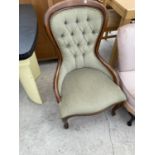 A MAHOGANY BUTTON BACK NURSING CHAIR