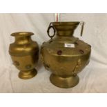 TWO LARGE BRASS POTS WITH ASSORTED STONES ONE WITH ORNATE DETAILING