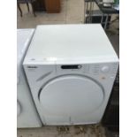 A MIELE NOVOTRONIC T7644C DRYER, FAIRLY CLEAN CONDITION IN WORKING ORDER