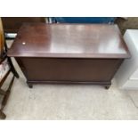 A STAG MINSTREL MAHOGANY BEDDING CHEST