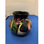 A MOORCROFT 4 INCH QUEEN'S CHOICE VASE