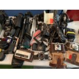A LARGE COLLECTION OF CAMERAS, LENSES, TRIPODS, CASES, FLASHES ETC