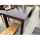 A RECTANGULAR PINE DINING TABLE