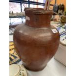 A LARGE GLAZED EARTHENWARE JUG 34CM TALL A/F