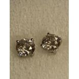 A PAIR OF 9 CARAT WHITE GOLD AND DIAMOND EARRINGS (0.98 CARAT)